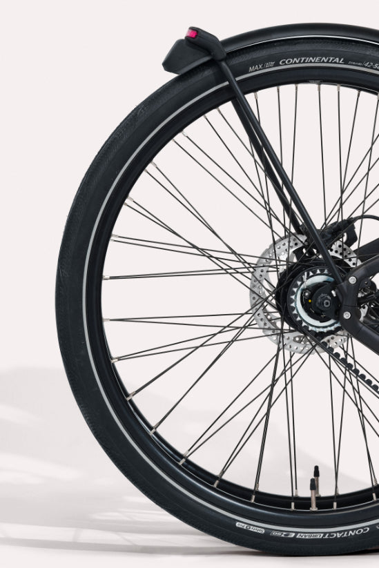 Les pneus anti crevaison continental urban contact du vélo pliant Bastille